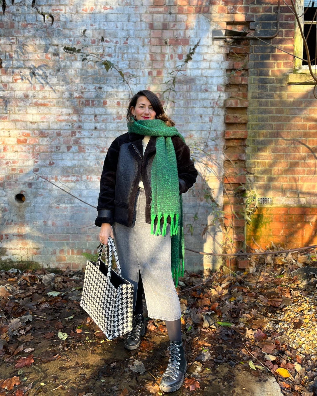 Pencil skirt with lug-sole boots and shearling coat