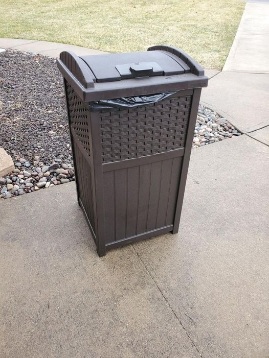 https://i.shopstyle-cdn.com/i/1bc37d96-443d-4080-b8ff-f36116eb8edc/20e-2bd/suncast-33-gallon-hideaway-can-resin-outdoor-trash-with-lid-use-in-backyard-deck-or-patio-brown-Kims-Steals-and-Deals.jpeg
