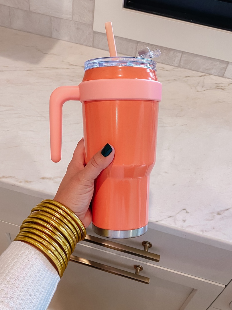 https://i.shopstyle-cdn.com/i/cc0a2ad7-1843-406a-881d-0e03649c9985/32a-438/reduce-tumbler-40-oz-tumbler-with-lid-and-straw-and-handle-36-hours-cold-vacuum-insulated-sweat-proof-body-large-insulated-mug-for-cold-and-hot-drinks-flamingo-cristincooper.jpeg